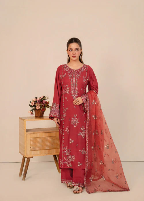 Model wearing Dusty Rose 3-piece embroidered luxury suit with dupatta by Afsura.