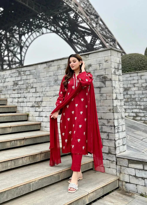 Model wearing Lilly 3-piece floral embroidered luxury suit with dupatta by Afsura.