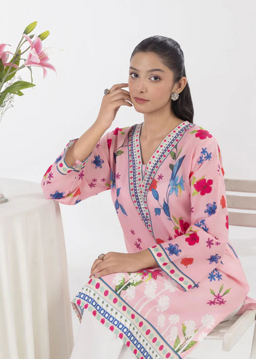 ntricate pink and blue floral pattern on breathable summer fabric.