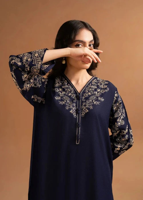 Elegant navy blue embroidered co-ord set with straight trousers.