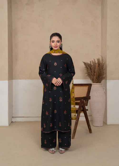 Model wearing Midnight Noir 3-piece black embroidered luxury suit with dupatta by Afsura.