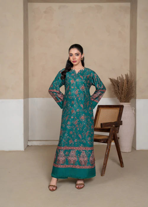 Model wearing Morni Parrot Green 2-piece embroidered suit by Afsura.