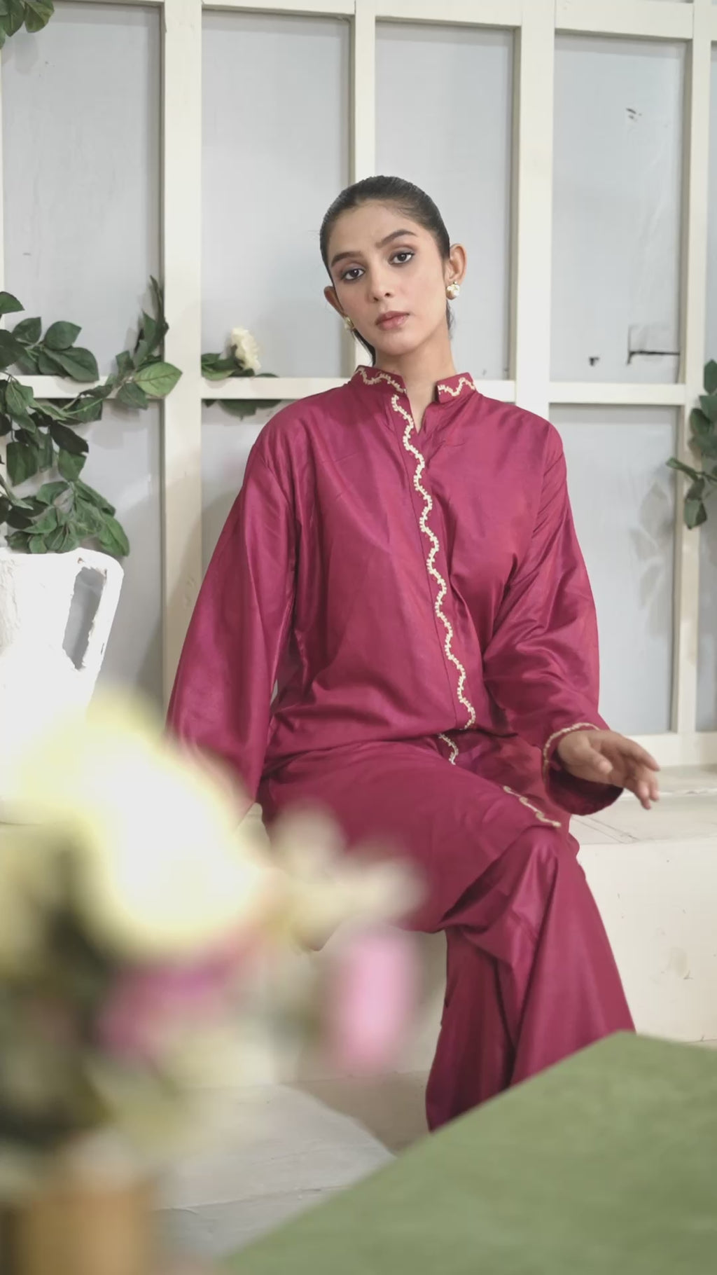 Close-up of scalloped embroidery on Mandarin collar and front placket.