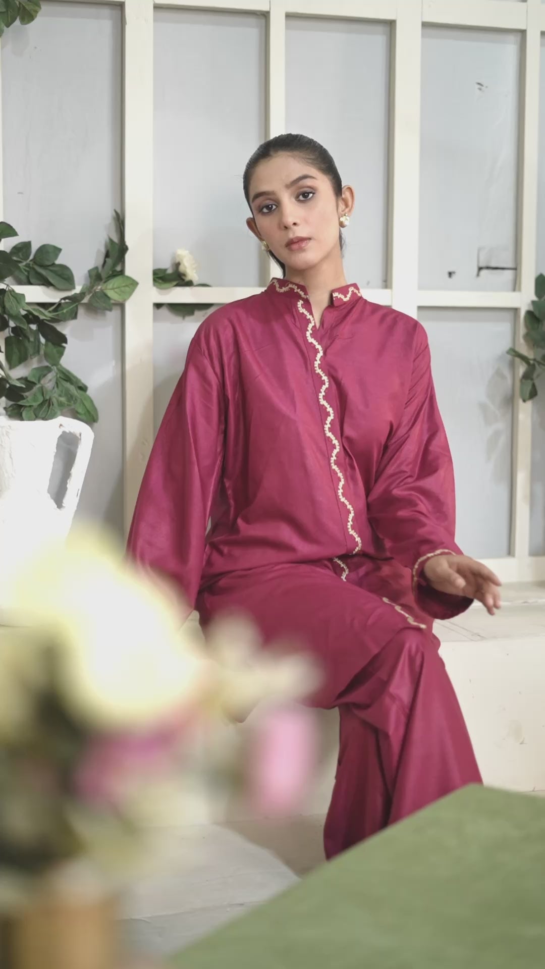 Close-up of scalloped embroidery on Mandarin collar and front placket.